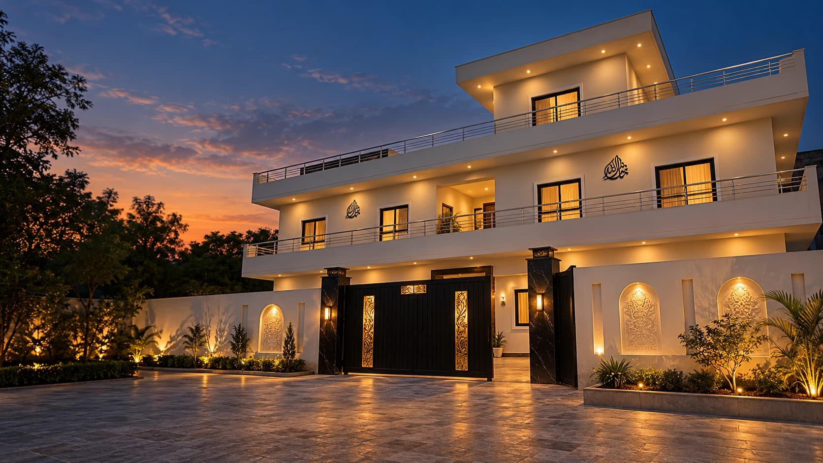An evening view of Monarch One’s white frontage and black-and-gold gate